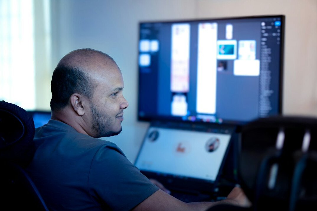 film editor working on computer
