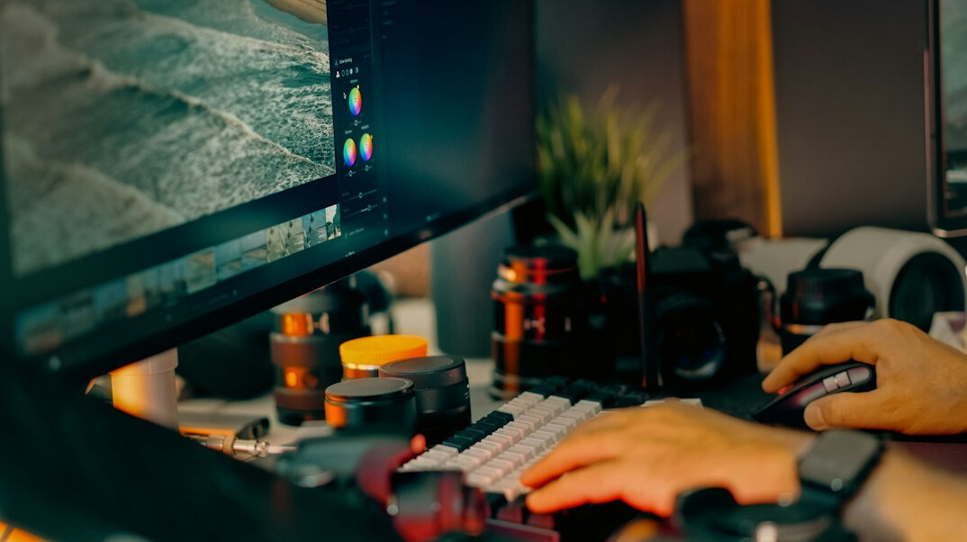 video editor working on computer